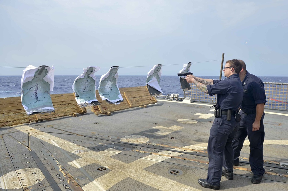 USS Forrest Sherman Sailors conduct weapons qualification