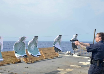 USS Forrest Sherman Sailors conduct weapons qualification