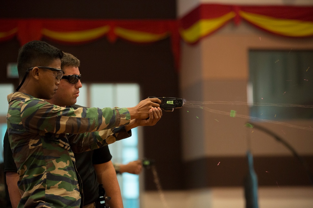 'Taser, Taser, Taser' US Marines train Malaysian Armed Forces on Taser Techniques