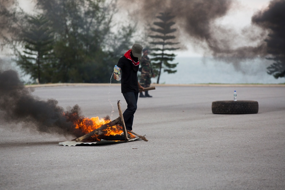 Malaysian Armed Forces demonstrate riot control techniques during NOLES