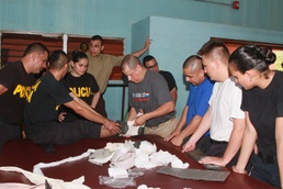 New Mexico National Guardsmen share immediate first aid techniques with Costa Rican law enforcement officials