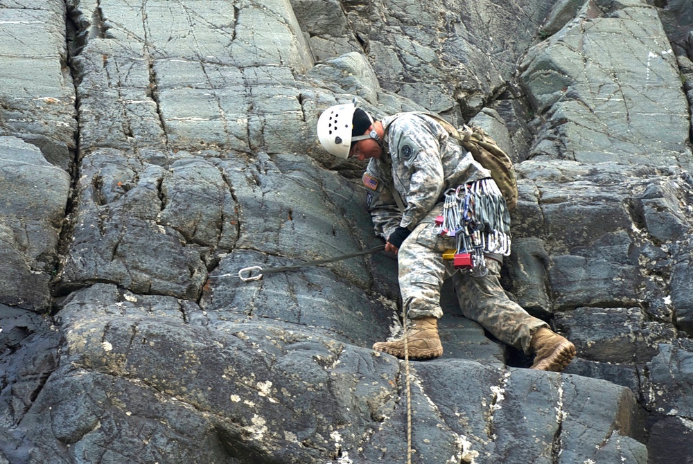 Soldiers climb mountains to serve