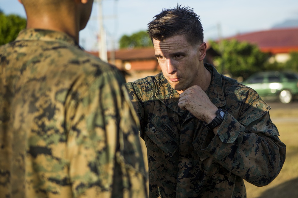 US Marines with SPMAGTF-SC take part in a MCMAP brown belt course