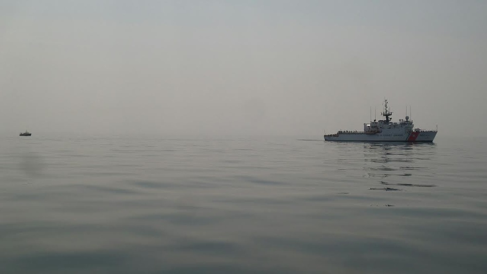 Coast Guard Cutter Escanaba tows disabled fishing vessel