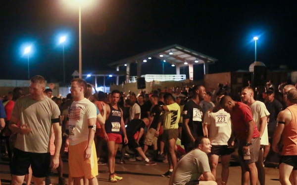 U.S. Service members and civilians run 5K aboard Camp Lemonnier