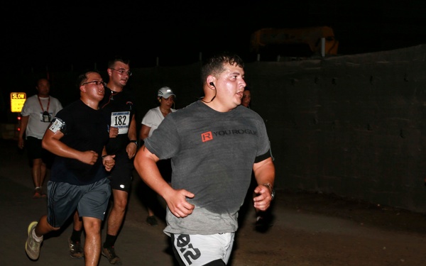 U.S. Service members and civilians run 5K aboard Camp Lemonnier