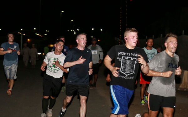 U.S. Service members and civilians run 5K aboard Camp Lemonnier