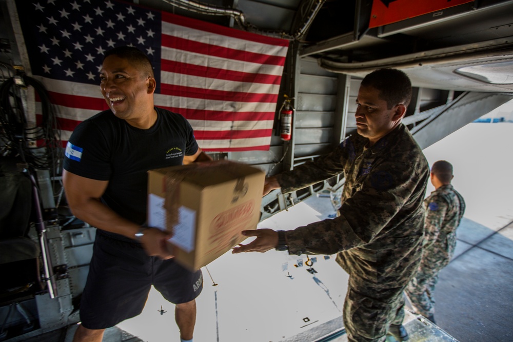 U.S. Marines with SPMAGTF-SC and Honduran Soldiers Load Medical Supplies for a Community Relations Event