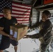 U.S. Marines with SPMAGTF-SC and Honduran Soldiers Load Medical Supplies for a Community Relations Event