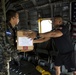U.S. Marines with SPMAGTF-SC and Honduran Soldiers Load Medical Supplies for a Community Relations Event