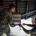 U.S. Marines with SPMAGTF-SC and Honduran Soldiers Load Medical Supplies for a Community Relations Event