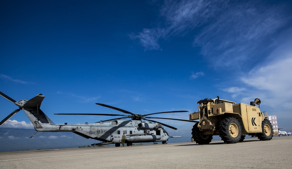 U.S. Marines with SPMAGTF-SC and Honduran Soldiers Load Medical Supplies for a Community Relations Event