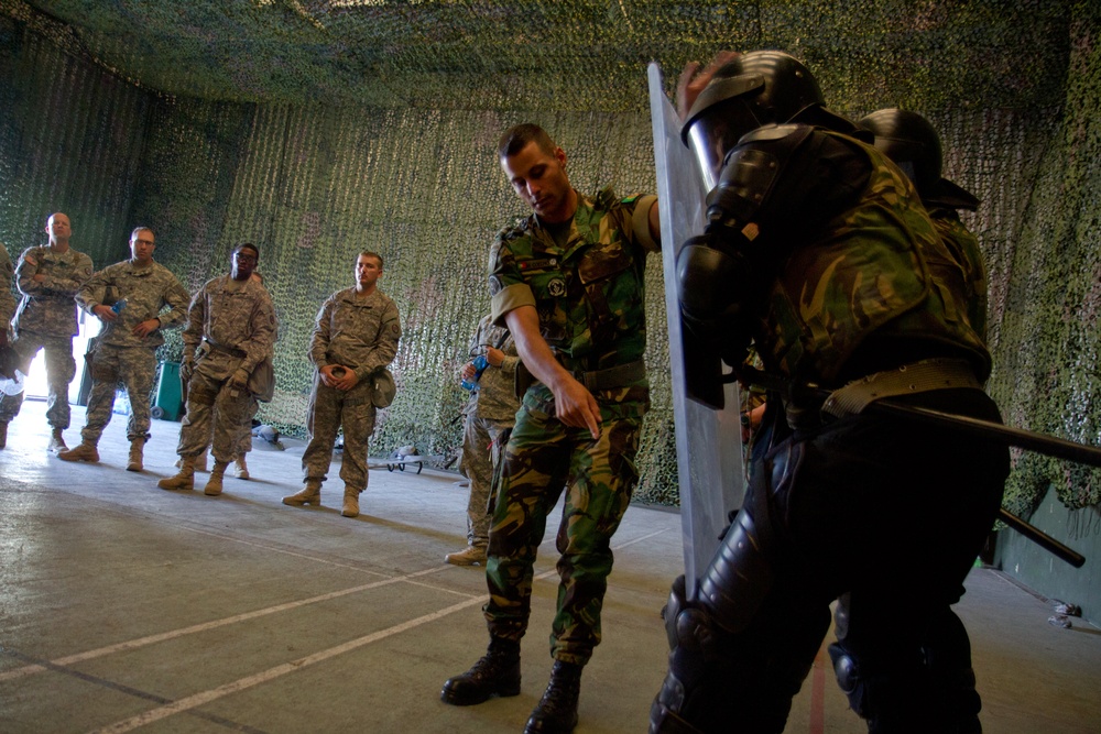 Portugese soldiers teach riot control techniques to N.C. National Guardsmen in Kosovo