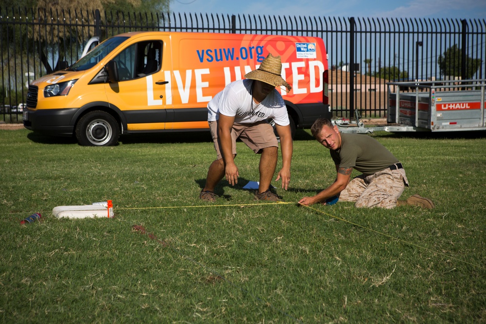 Marines participate in a community service project at David Crockett Elementary School