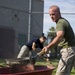 Marines participate in a community service project at David Crockett Elementary School