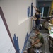 Marines participate in a community service project at David Crockett Elementary School