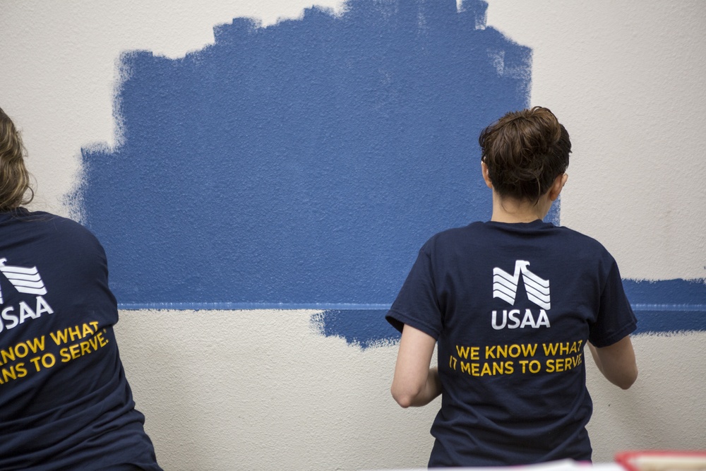 Marines participate in a community service project at David Crockett Elementary School