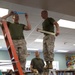 Marines participate in a community service project at David Crockett Elementary School