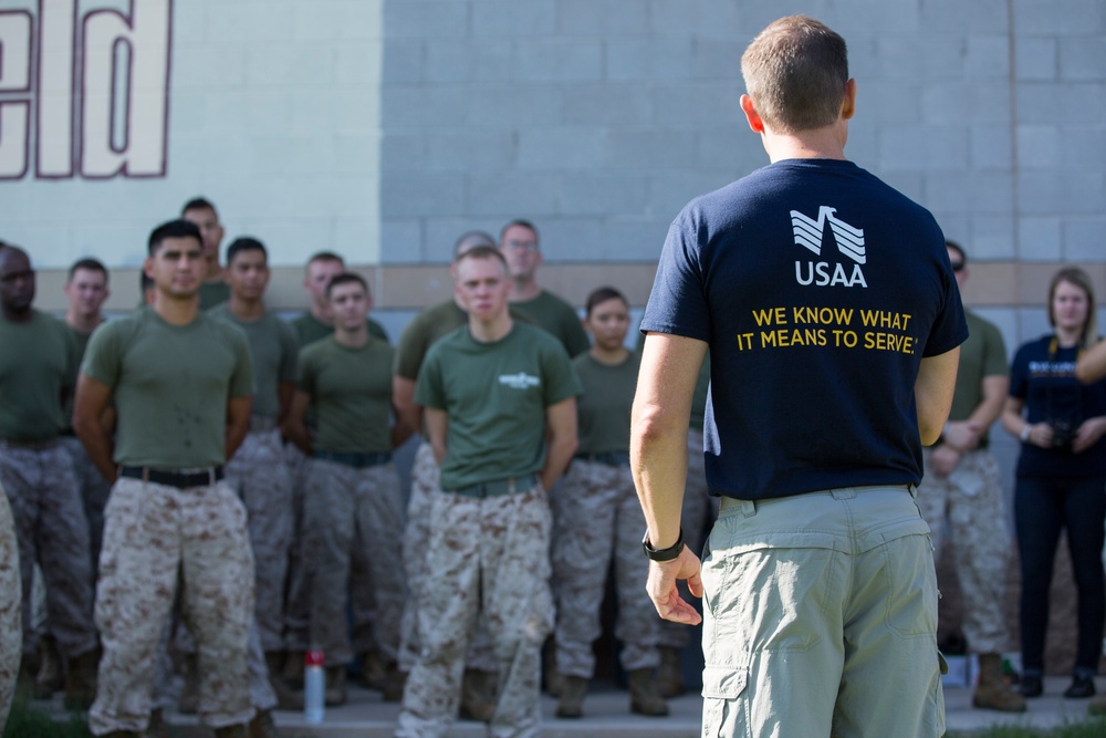 Marines participate in a community service project at David Crockett Elementary School