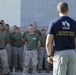 Marines participate in a community service project at David Crockett Elementary School