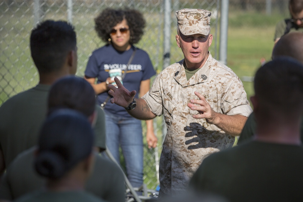 Marines participate in a community service project at David Crockett Elementary School