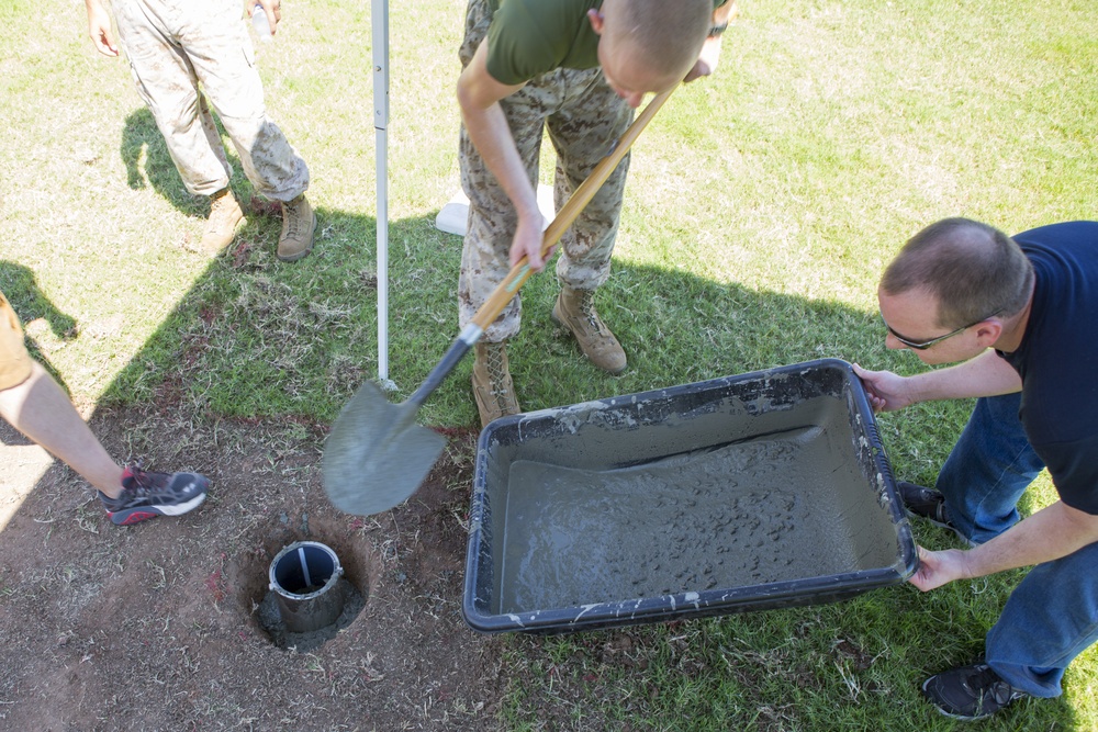 Marines participate in a community service project at David Crockett Elementary School