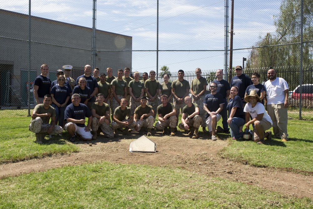 Marines participate in a community service project at David Crockett Elementary School