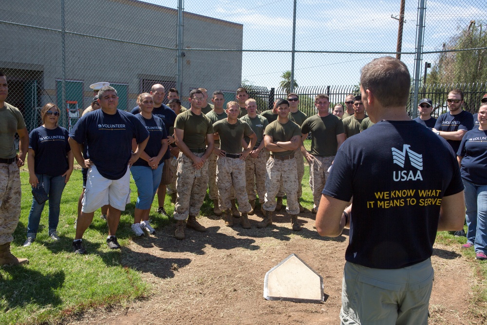 Marines participate in a community service project at David Crockett Elementary School