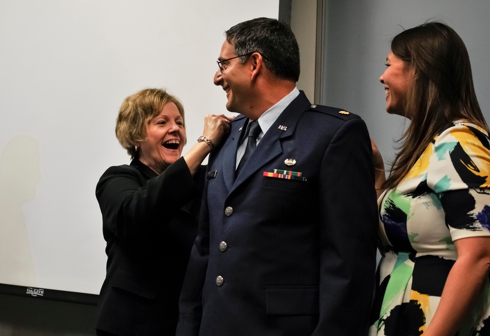 182nd Airlift Wing promotes deputy staff judge advocate to major