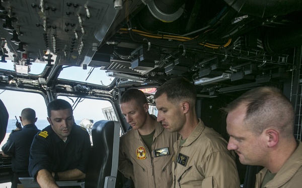 American Osprey lands on Spanish ship