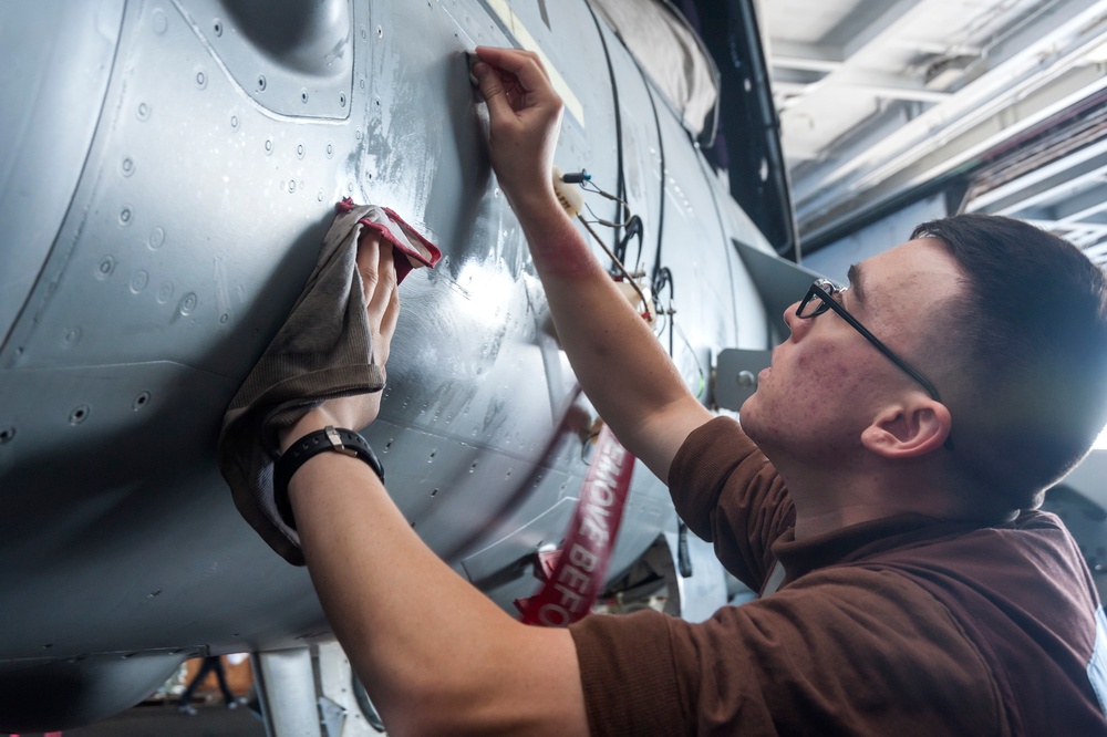 Maintenance in USS Harry S. Truman hangar bay