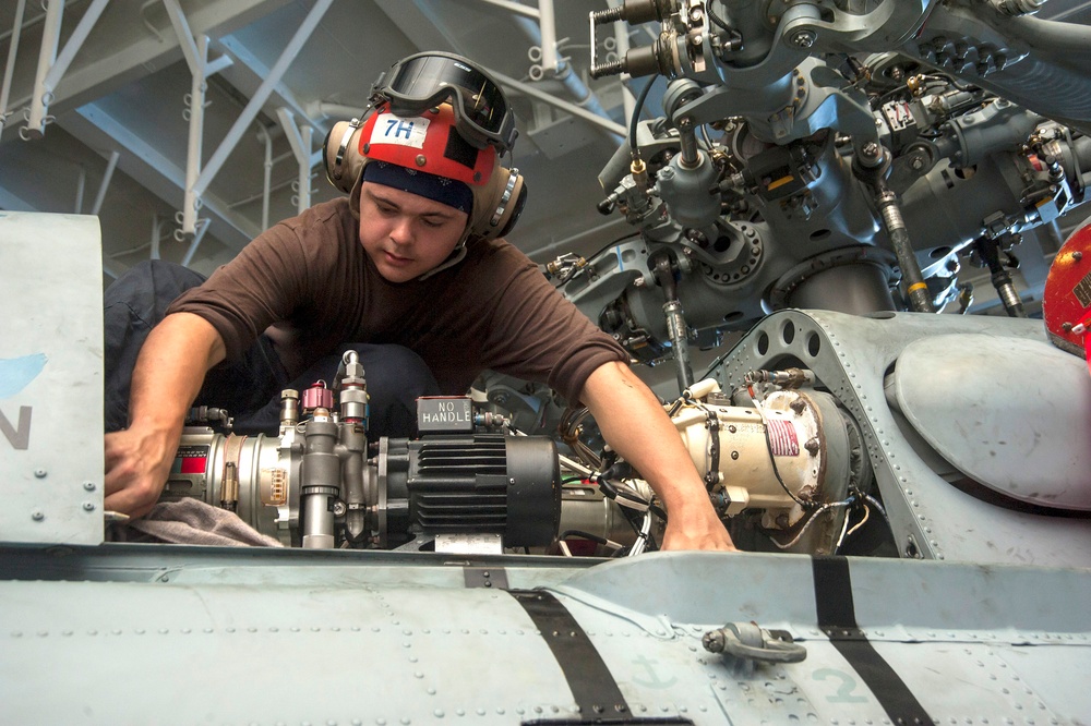 Maintenance in USS Harry S. Truman hangar bay