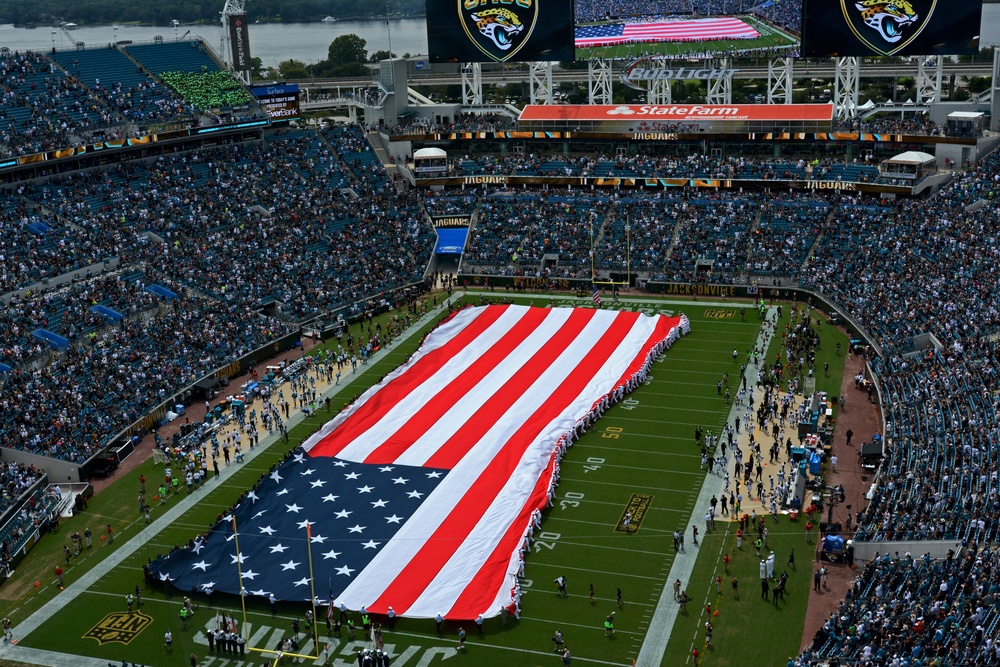 Jacksonville Jaguars fans celebrate a Salute to Service during opening  ceremonies of an NFL football game at EverBank Field against the  Indianapolis Colts, Thursday, Nov. 8, 2012, in Jacksonville, Fla. The Colts