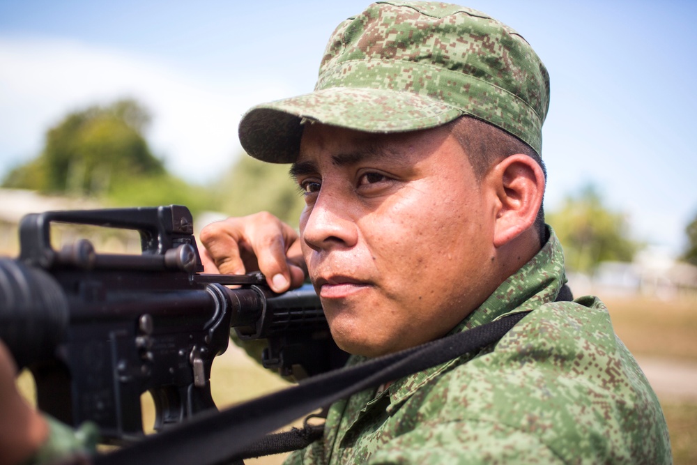 U.S. Marines instruct soldiers with Belize Defence Force in Rifle Marksmanship