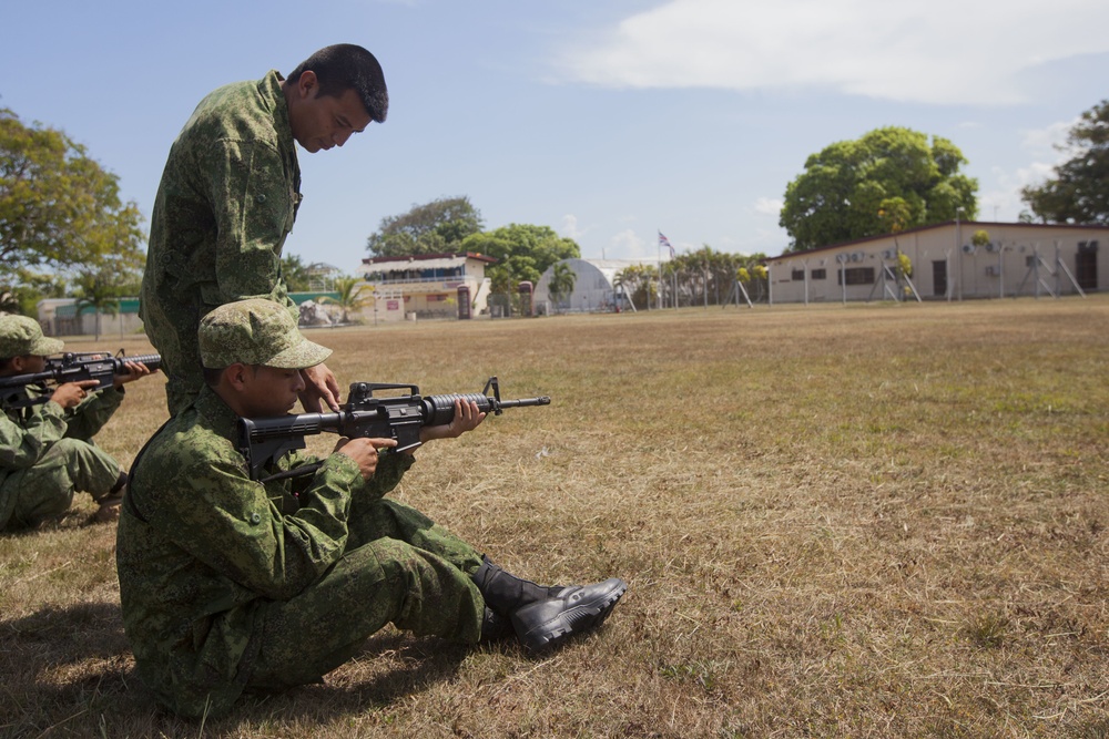 U.S. Marines instruct soldiers with Belize Defence Force in Rifle Marksmanship