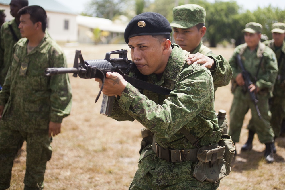 U.S. Marines instruct soldiers with Belize Defence Force in Combat Marksmanship