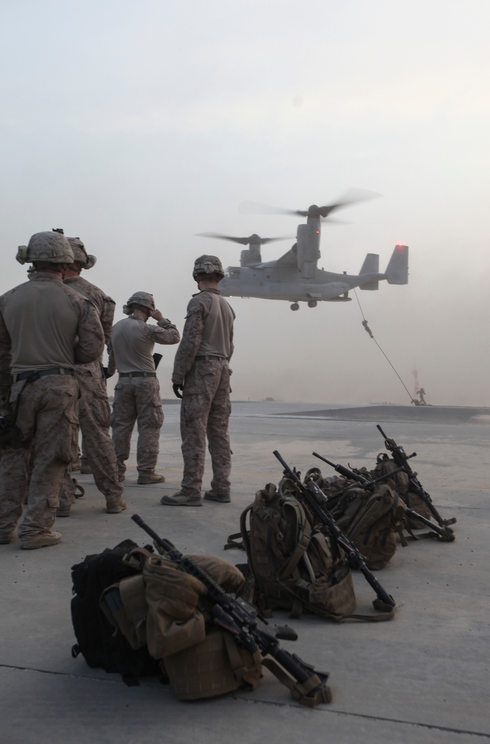 U.S. Marines fast rope from MV-22s in Southwest Asia