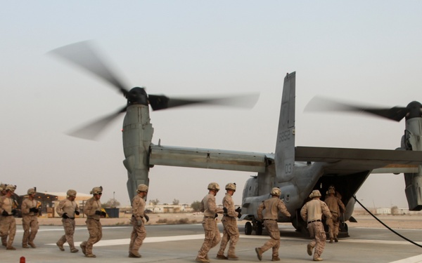 U.S. Marines fast rope from MV-22s in Southwest Asia
