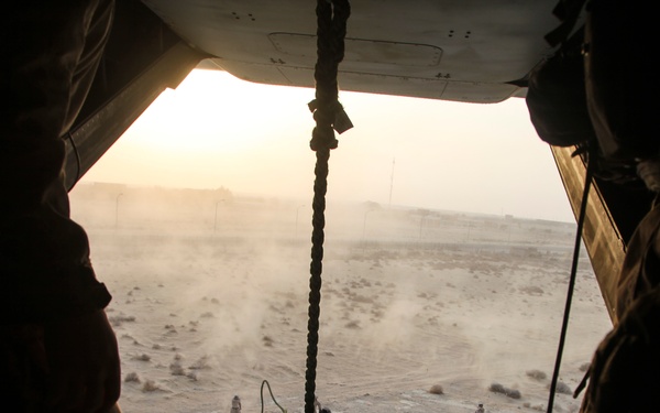 U.S. Marines fast rope from MV-22s in Southwest Asia
