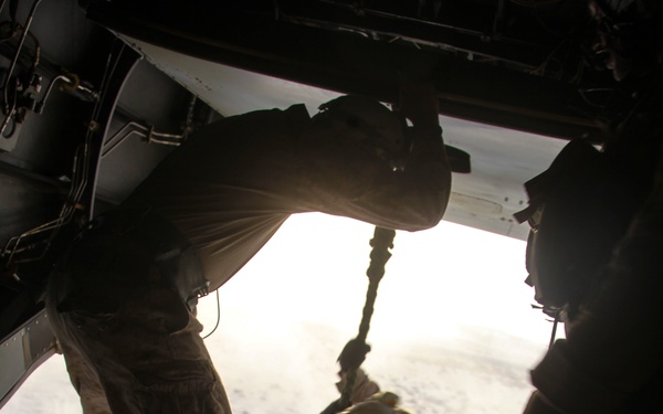 U.S. Marines fast rope from MV-22s in Southwest Asia