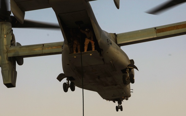 U.S. Marines fast rope from MV-22s in Southwest Asia