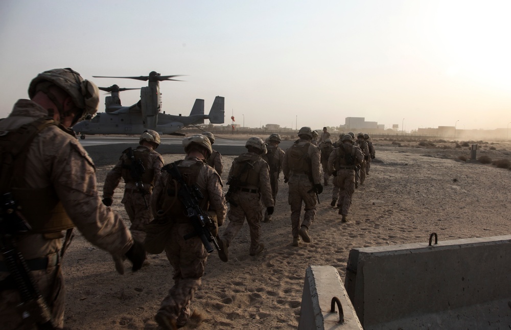 U.S. Marines fast rope from MV-22s in Southwest Asia