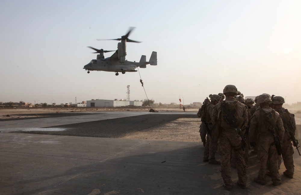 U.S. Marines fast rope from MV-22s in Southwest Asia