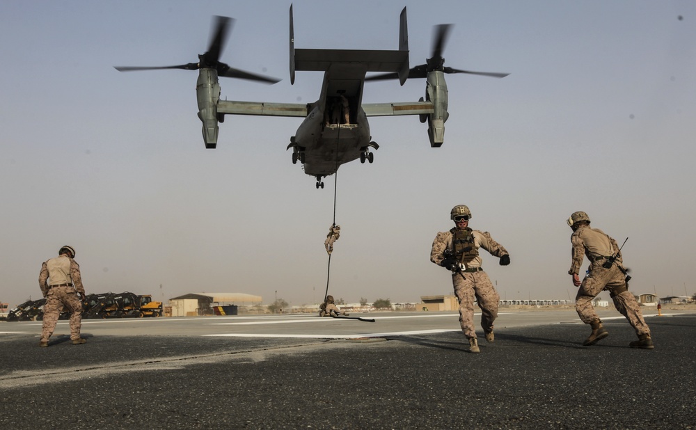 U.S. Marines fast rope from MV-22s in Southwest Asia