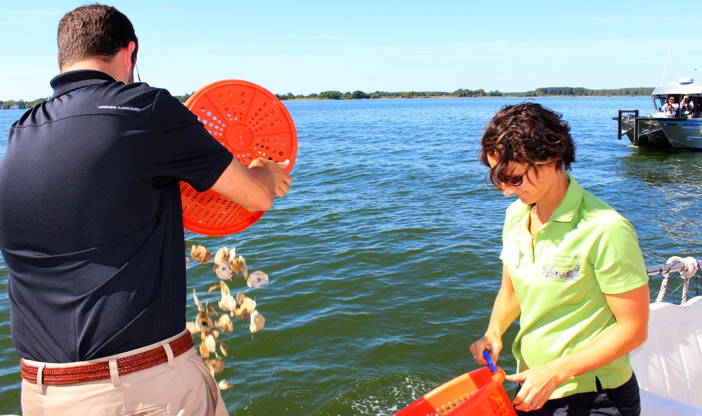 Spat tossed overboard the REBECCA T. RUARK at event marking completion of world's largest oyster restoration project