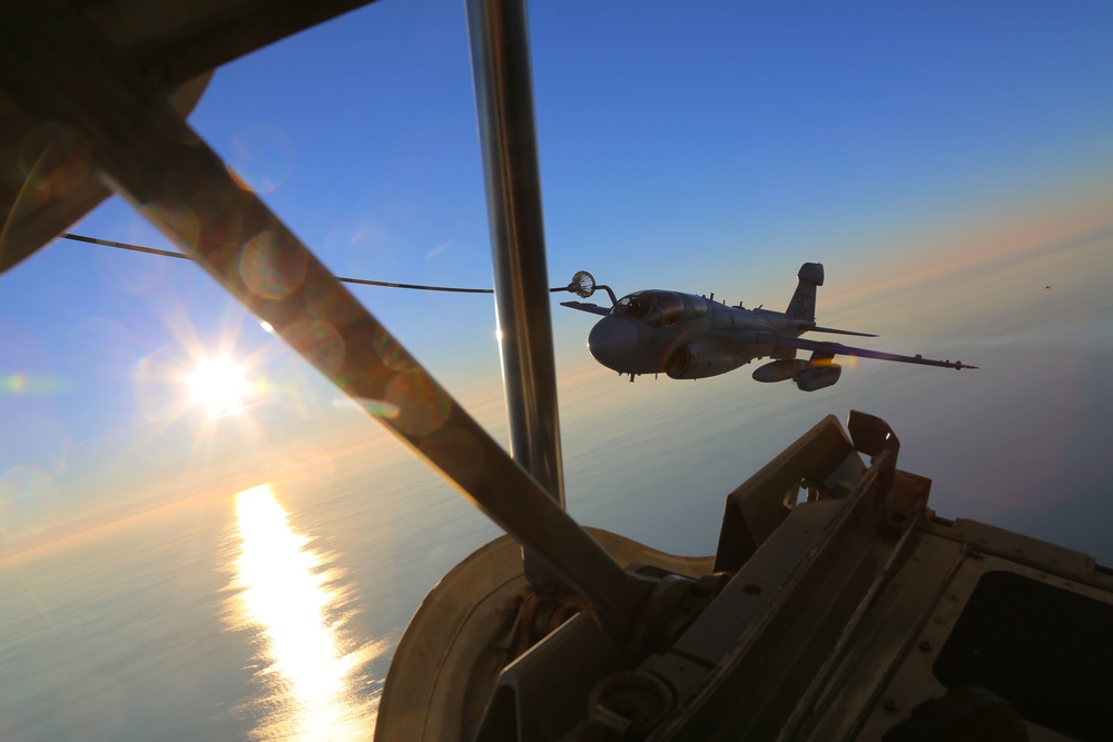 Cherry Point aircraft glide through setting skies