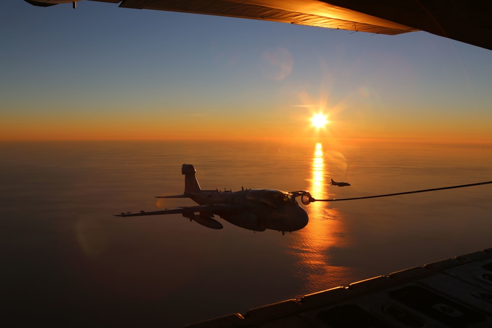 Cherry Point aircraft glide through setting skies