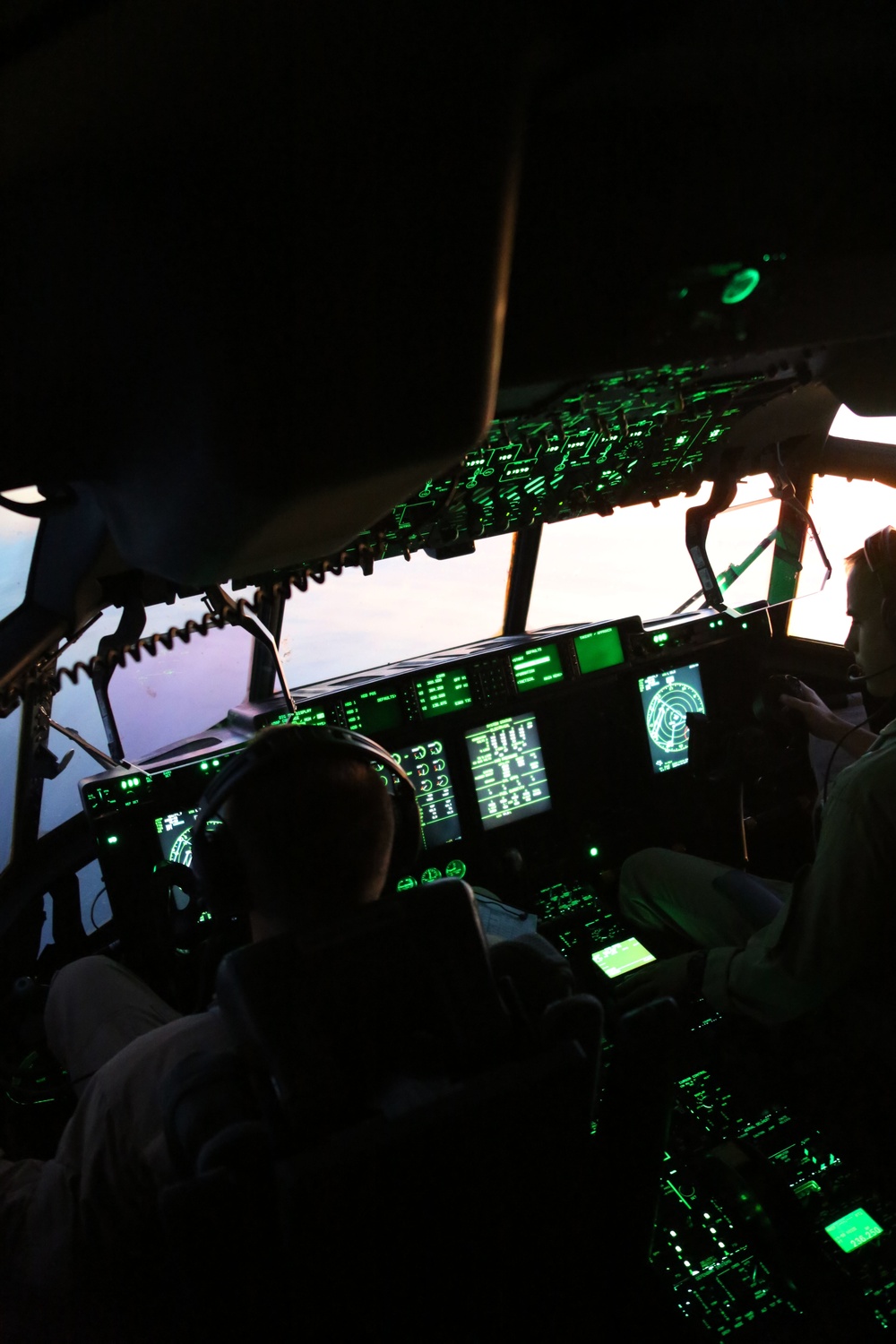 Cherry Point aircraft glide through setting skies