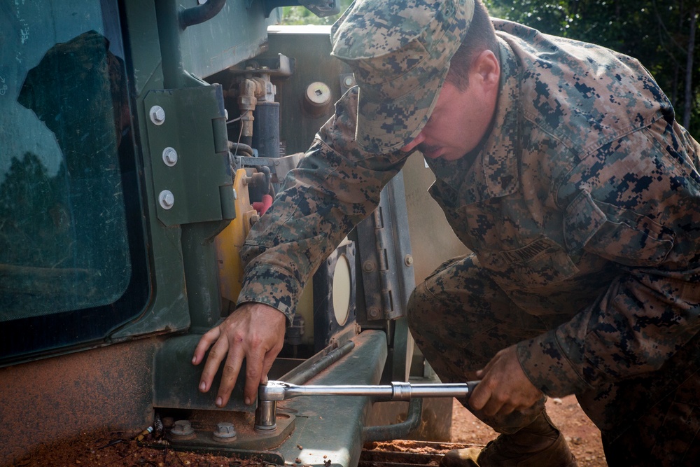 Camp Lejeune Marine fixes bulldozer on Mocoron Airfield