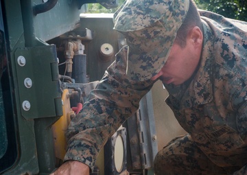 Camp Lejeune Marine fixes bulldozer on Mocoron Airfield